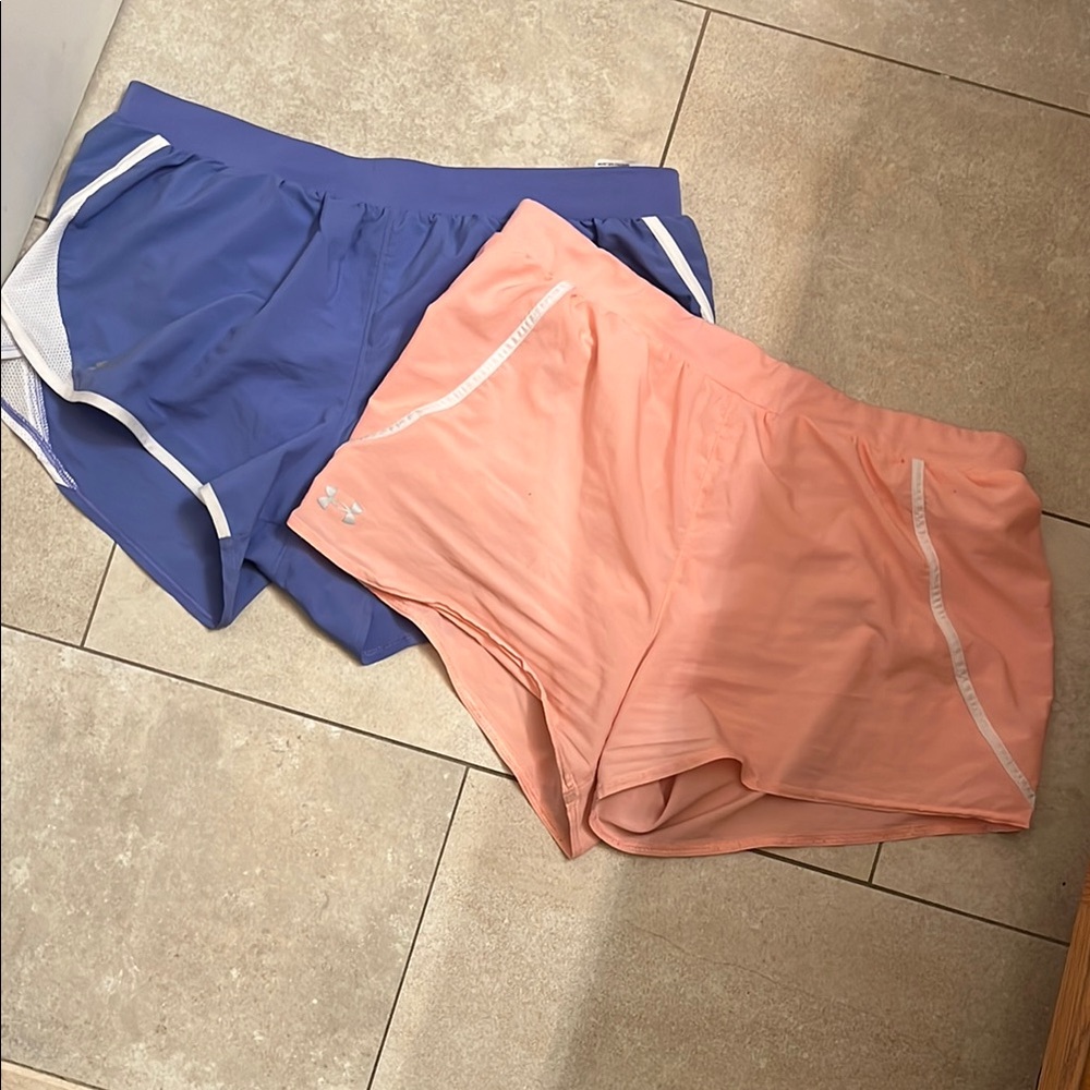 Two Pair Women’s Under Armour Shorts
Lavender & Peach. Size: Large